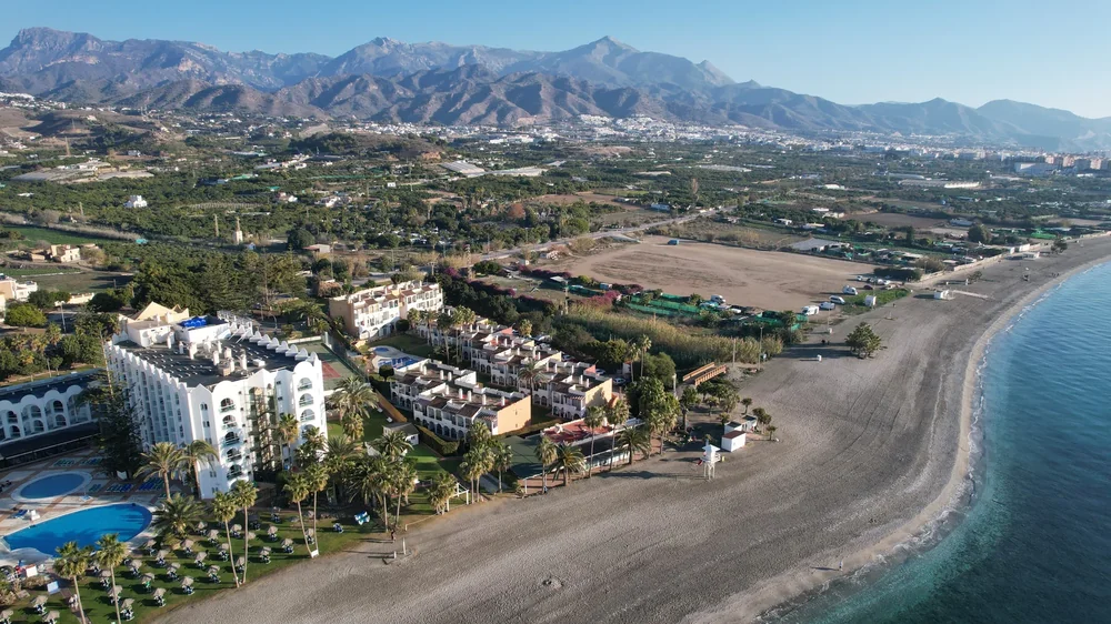 Aerial view of the Río Marinas complex in Nerja, next to the beach